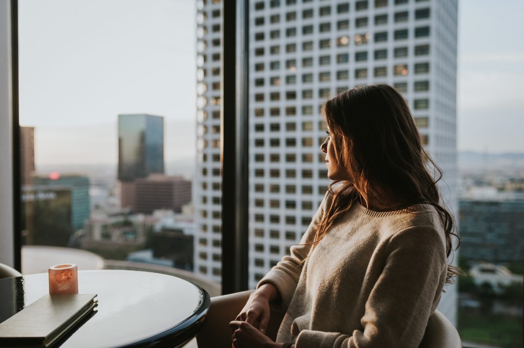 Woman considering why things keep recurring